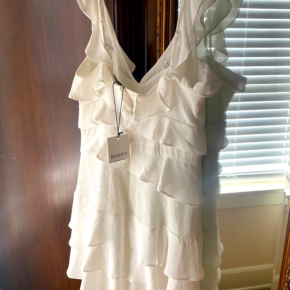 Gorgeous off white dress perfect for graduation , summer parties etc